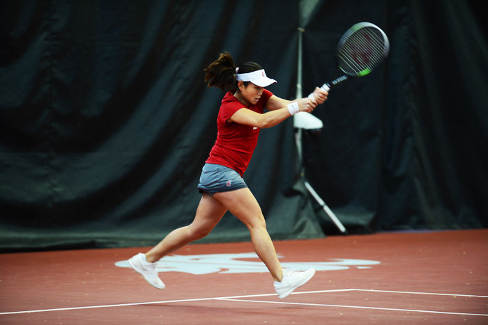 Senior+Trang+Huynh+hits+a+backhand+during+a+match+against+Seattle+University+on+Feb.+6.
