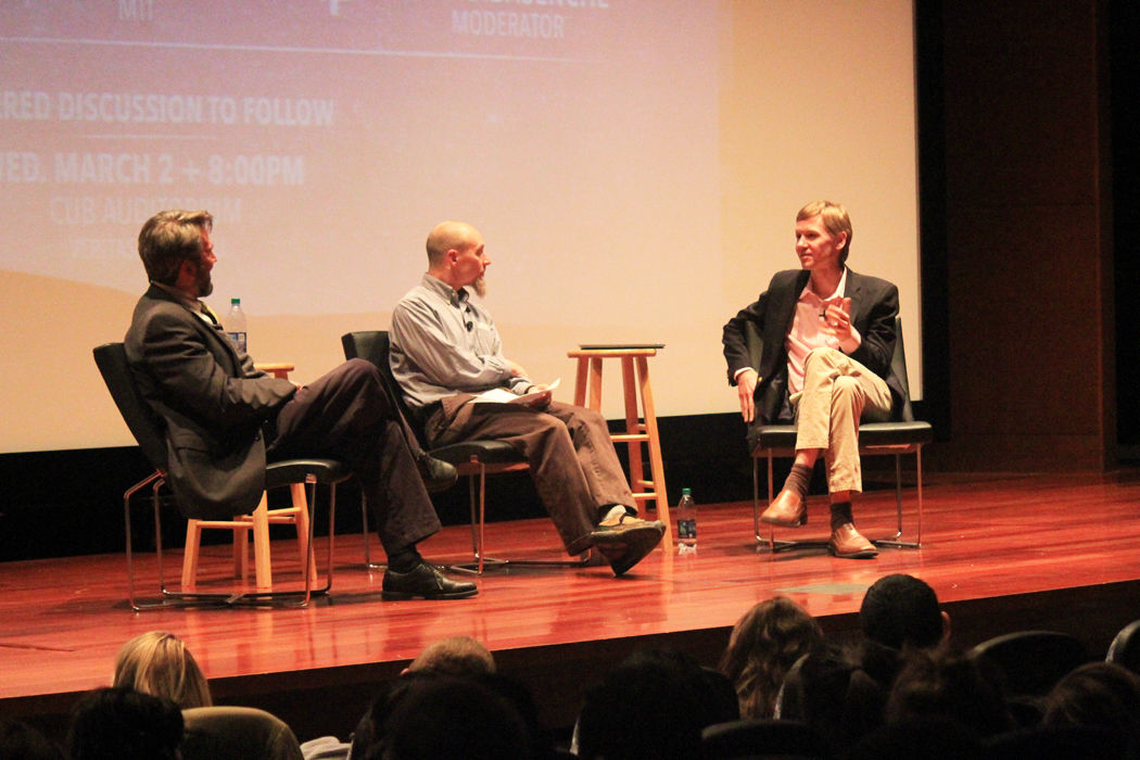 WSU professor Michael Goldsby and MIT professor Troy Van Voorhis speak at the Veritas forum.