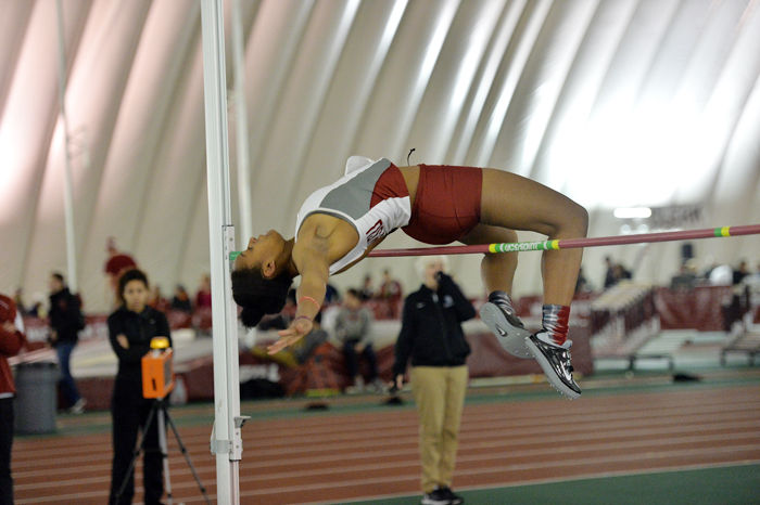 Senior Lateah Holmes clears the bar during the high jump event at the Cougar Indoor in Pullman, March 1.