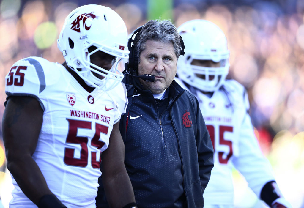 WSU+Head+Coach+Mike+Leach+on+the+sidelines+as+his+team+trails+during+the+first+half+of+the+108th+Apple+Cup+against+Washington+at+Husky+Stadium+in+Seattle+on+Friday%2C+Nov.+27%2C+2015.+Washington+won%2C+45-10.