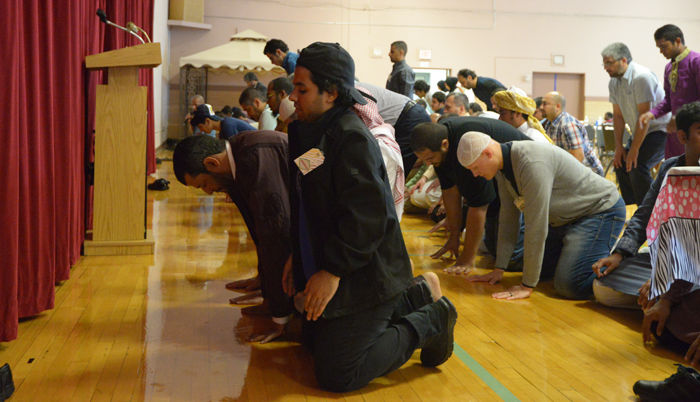 Muslims from across the Pacific Northwest pray at the Gladish Community and Cultural Center during the Eid al-Fitr celebration on Saturday.
