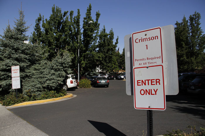 Unpopular though it may be, it is necessary: Not every Coug can park on campus. 