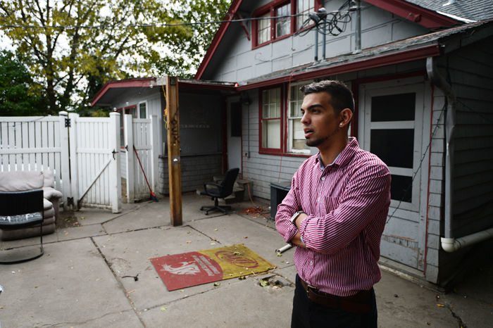 Alex Rodriguez stands on the patio where he was assaulted during a party over the summer at what was then his house.  His alleged attackers, both football players, were arrested on Friday but continue to play in football games.