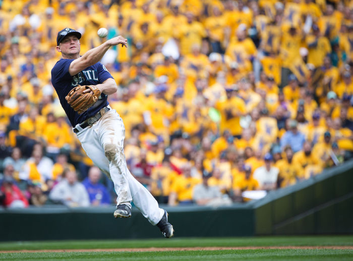 Mariners third baseman Kyle Seager makes an off-balance throw to first in a game at Safeco Field on Sept. 5.