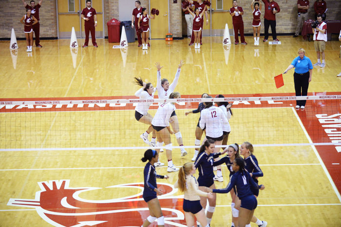 WSU Volleyball celebrates after a point scored against George Washington University Sept. 9.