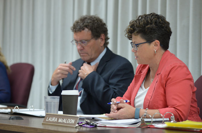Mark Workman, city supervisor (left), and Laura McAloon (right) at Tuesday night’s city council meeting.
