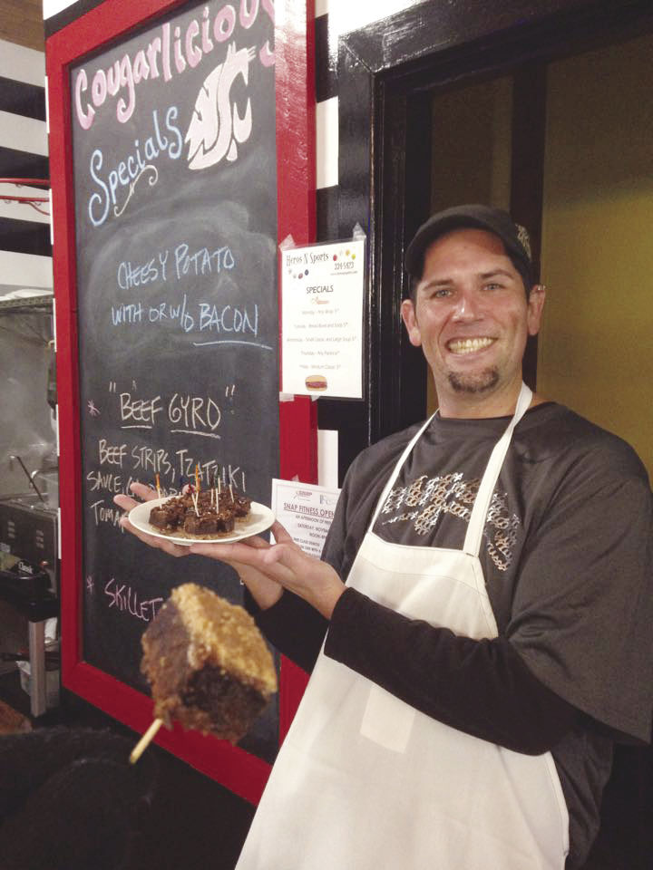 Local business, Heroes N Sports, serves salted caramel brownies during Chocolate Decadence.