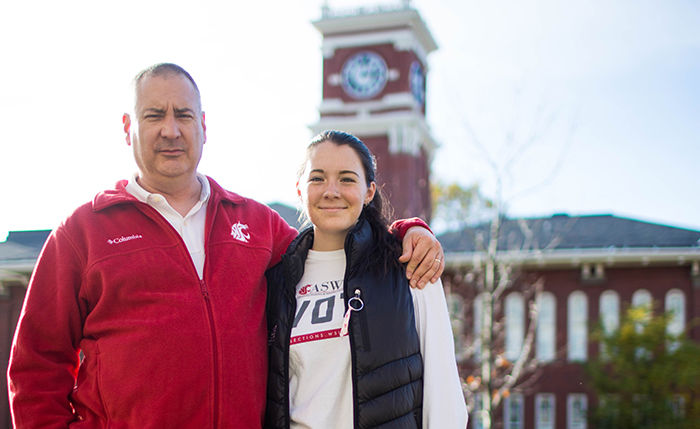 WSU sophomore Devon Holze and her dad Wayne pose in front of Bryan Hall on Nov. 3. 