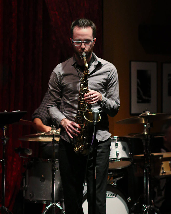 Jazz performer, John Nastos, plays multiple instruments.