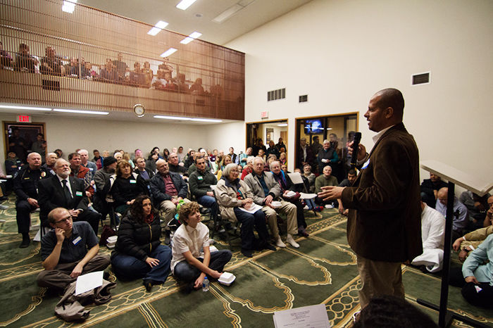 Mohamed Elsehmawy, an imam with the Islamic Center of Tri-Cities, speaks during the Pullman Islamic Center’s open house on Saturday.