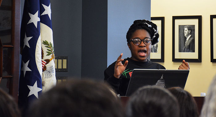 Charlene Carruthers, a youth activist and an organizer, speaks on Thursday at the Foley Institutes Coffee and Politics event.