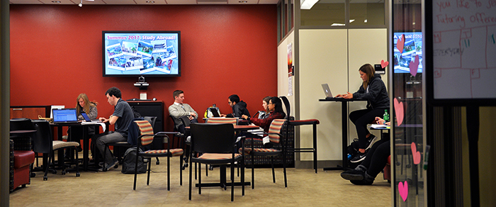 Business students studying on Monday by the Carson Center, a room focused on providing for business students.