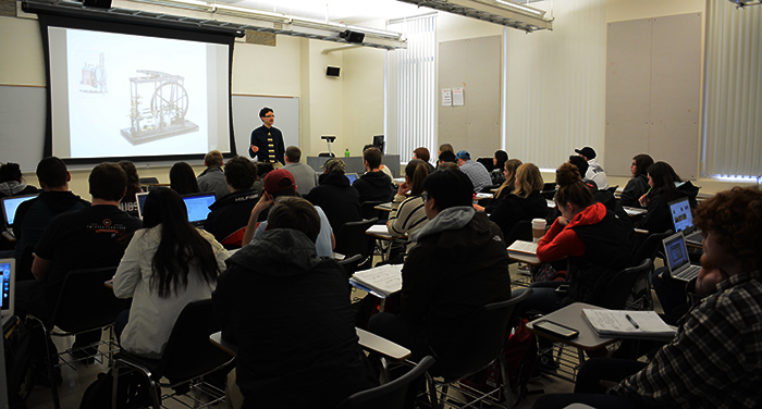 Phillip Guingona, a History 105 professor, lectures his students on Tuesday in Carpenter Hall. History 105 is required for most students.