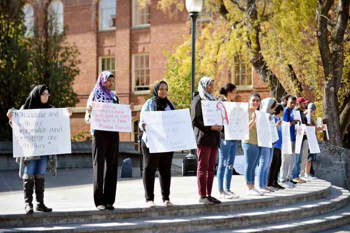 Muslim+Student+Association+members+protesting+the+Women%E2%80%99s+Resource+Center%E2%80%99s+Week+Without+Violence%E2%80%9D+on+Oct.+15%2C+2015+on+Todd+Hall+steps.