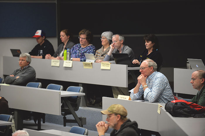 Faculty members at the Faculty Senate meeting on Thursday.
