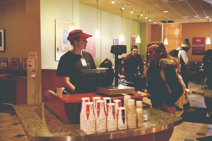 Hillside cashier Emily serves customers, most of whom have RDA accounts through WSU Housing and Dining Services.