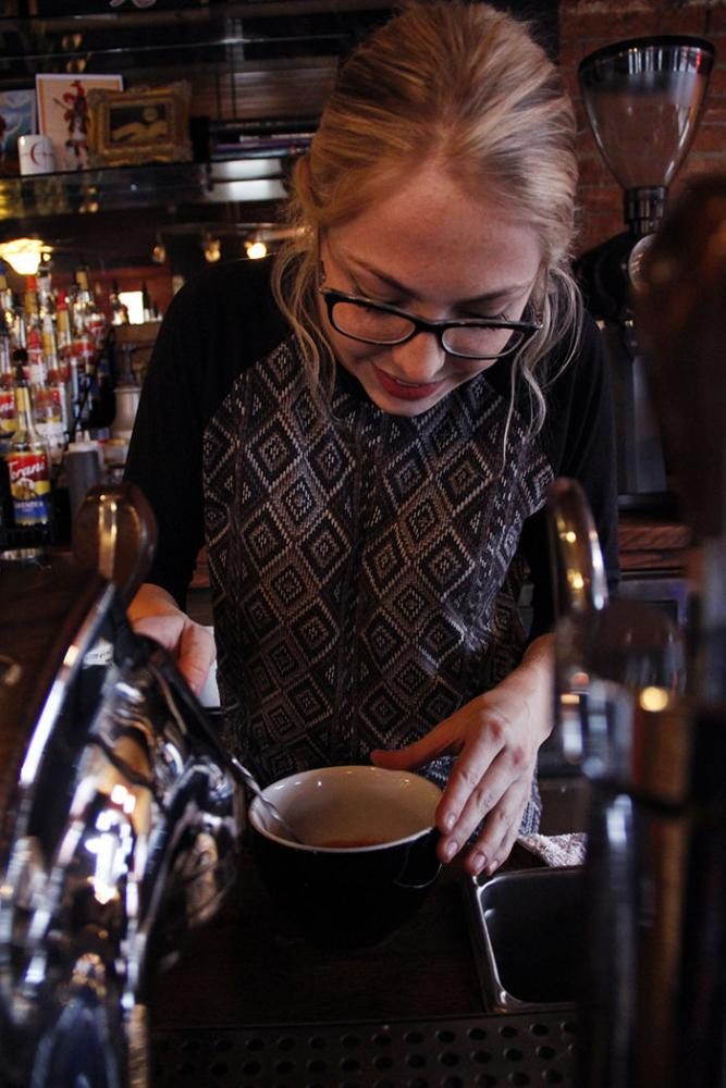 Lauren Klemp, a University of Idaho senior studying business and psychology, makes coffee while on shift at Café Moro on Feb. 6.