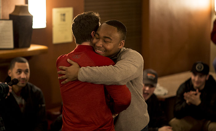 Jordan Frost and Garrett Kalt embrace upon hearing they are the new ASWSU president and vice president.