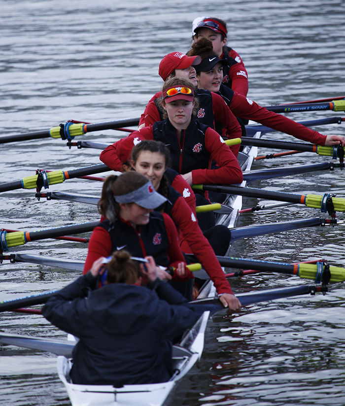 Members of the WSU women’s rowing team warm up on the Snake River at Wawawai Landing for their dual regatta against Gonzaga on Saturday.