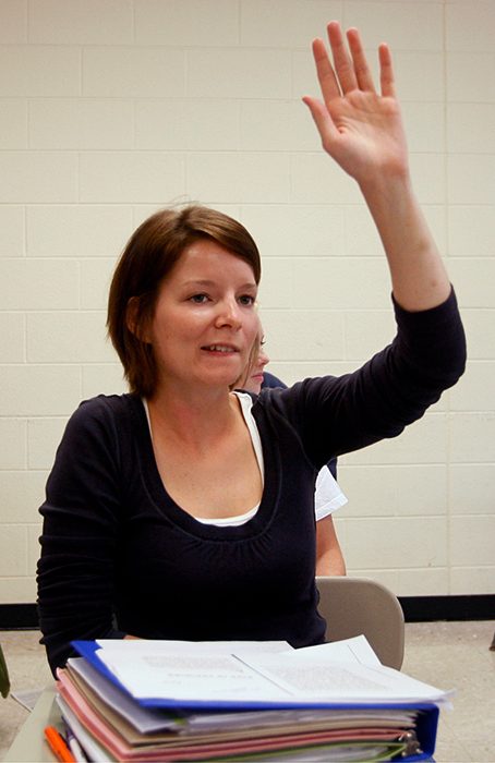 Christie Jones, who used a scholarship designed for former foster children, participates in a Women Studies class at the University of Kansas in Lawrence, Kansas, September 26, 2007. 