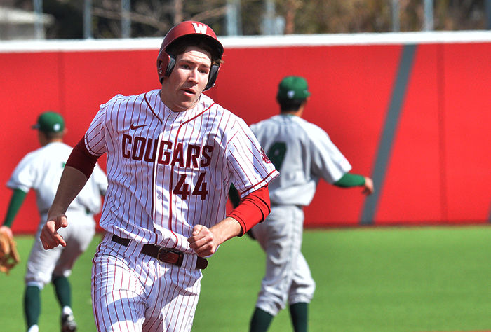 Freshman infielder Dillion Flew rounds third base in a game against Utah Valley on March, 12 at Bailey-Brayton Field. 