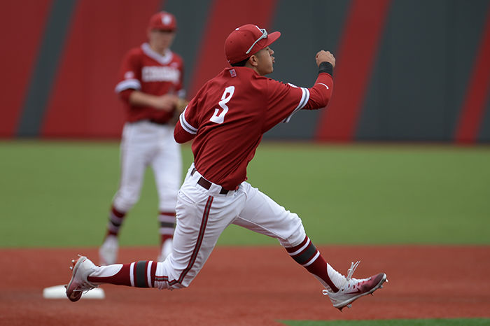 WSU+sophomore+shortstop+Andres+Alvarez+throws+to+first+base+in+a+game+against+Utah+Valley+on+March+11.+Alvarez+recorded+five+hits+in+12+at-bats+out+of+the+leadoff+spot+for+the+Cougars+in+their+series+at+Arizona+State+and+also+recorded+a+base+on+balls.