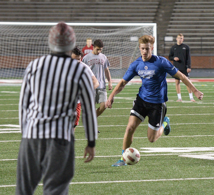Students play in an intramural soccer match on April 23 in Martin Stadium.