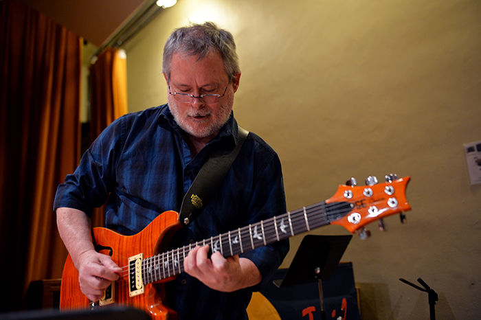 WSU guitar instructor Brad Ard rehearses for a jazz performance.