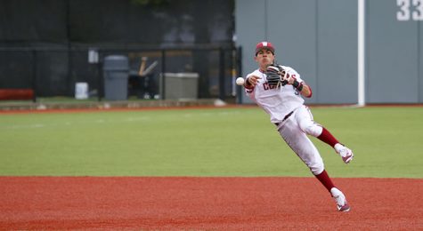 Sophomore infielder Andres Alvarez throws a runner out against Cal State Northridge on March 25.
