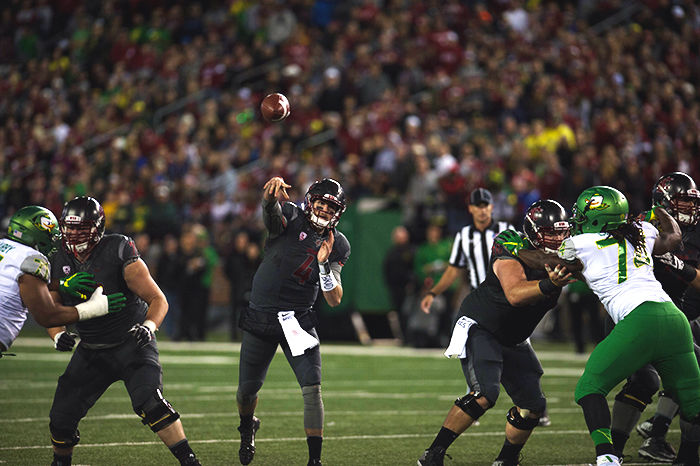 Redshirt senior Luke Falk throws a pass against the University of Oregon on Oct. 1. The Cougars won the game 51-33.