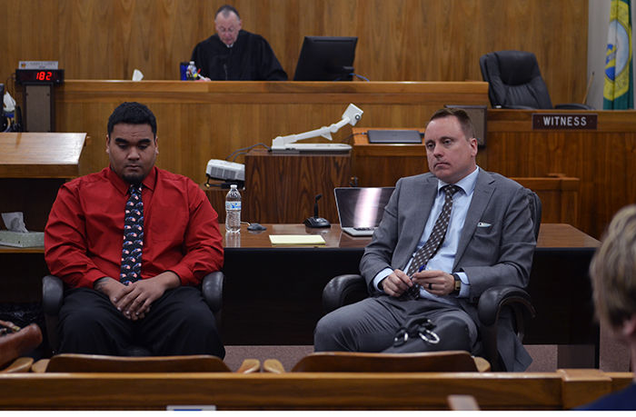 Robert Barber, left, and his attorney Steve Graham listen to potential jurors answer questions during the trial on May 15 at the Whitman County District Court in Colfax.