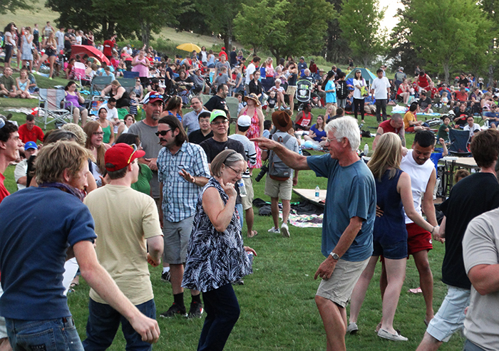People dance to live music on the Fourth of July in 2011 at Sunnyside Park.