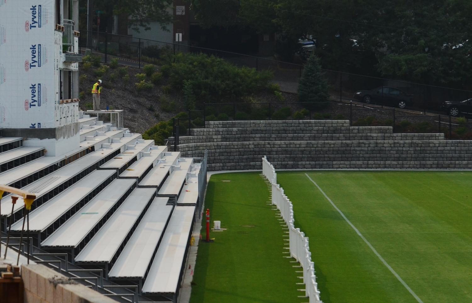 Workers finish up improvements to the WSU soccer field Aug. 9. Renovations were originally expected 
to be completed well before the start of the season.