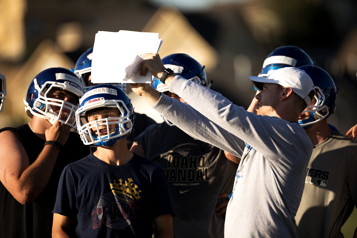 Head Coach David Cofer shows his Pullman High School football team specific plays.