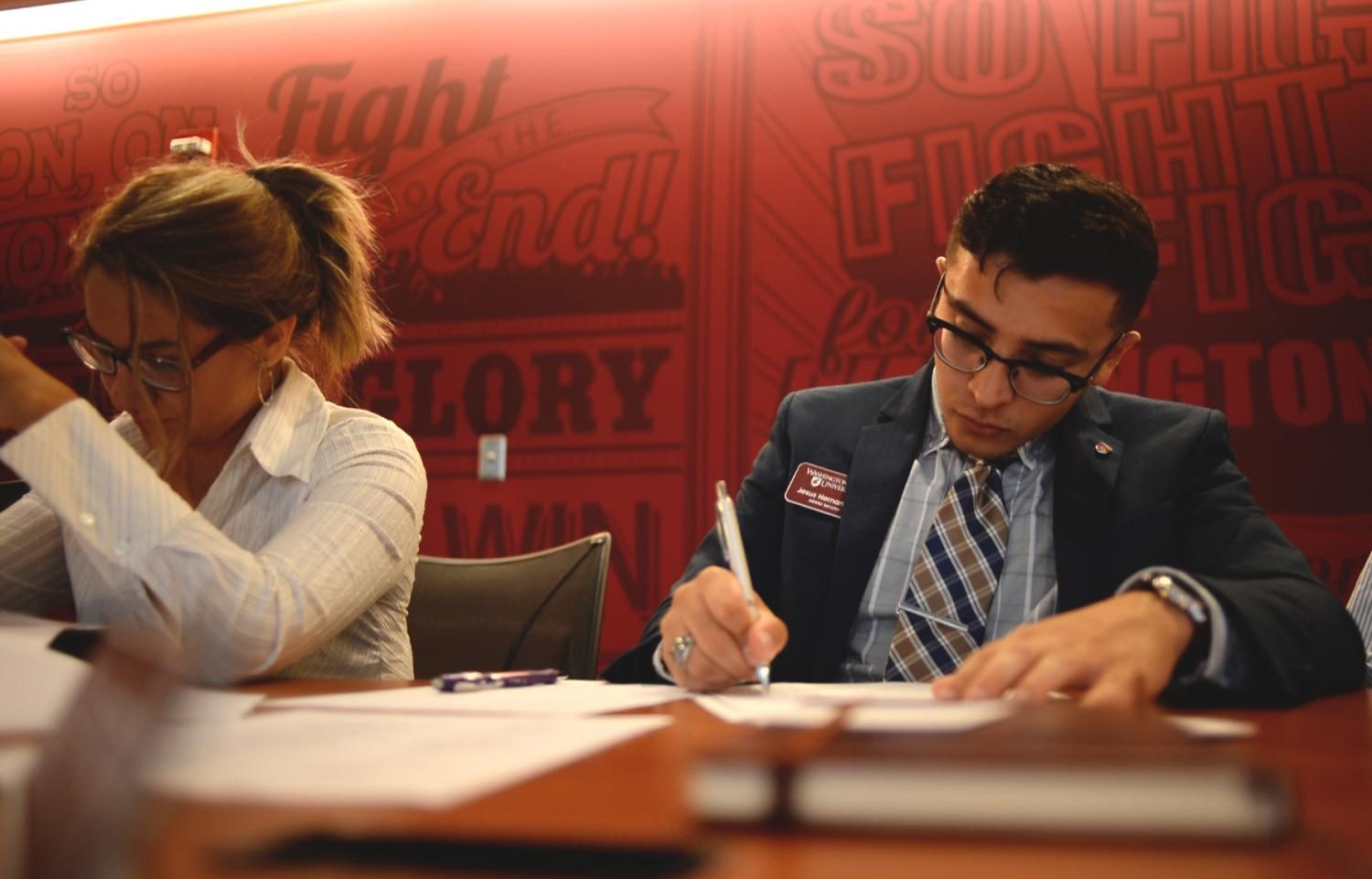 Jesus Herdnandez, Carson College senator, takes notes while listening to a speaker at the first ASWSU senate meeting of the fall semester on Wednesday at the CUB.
