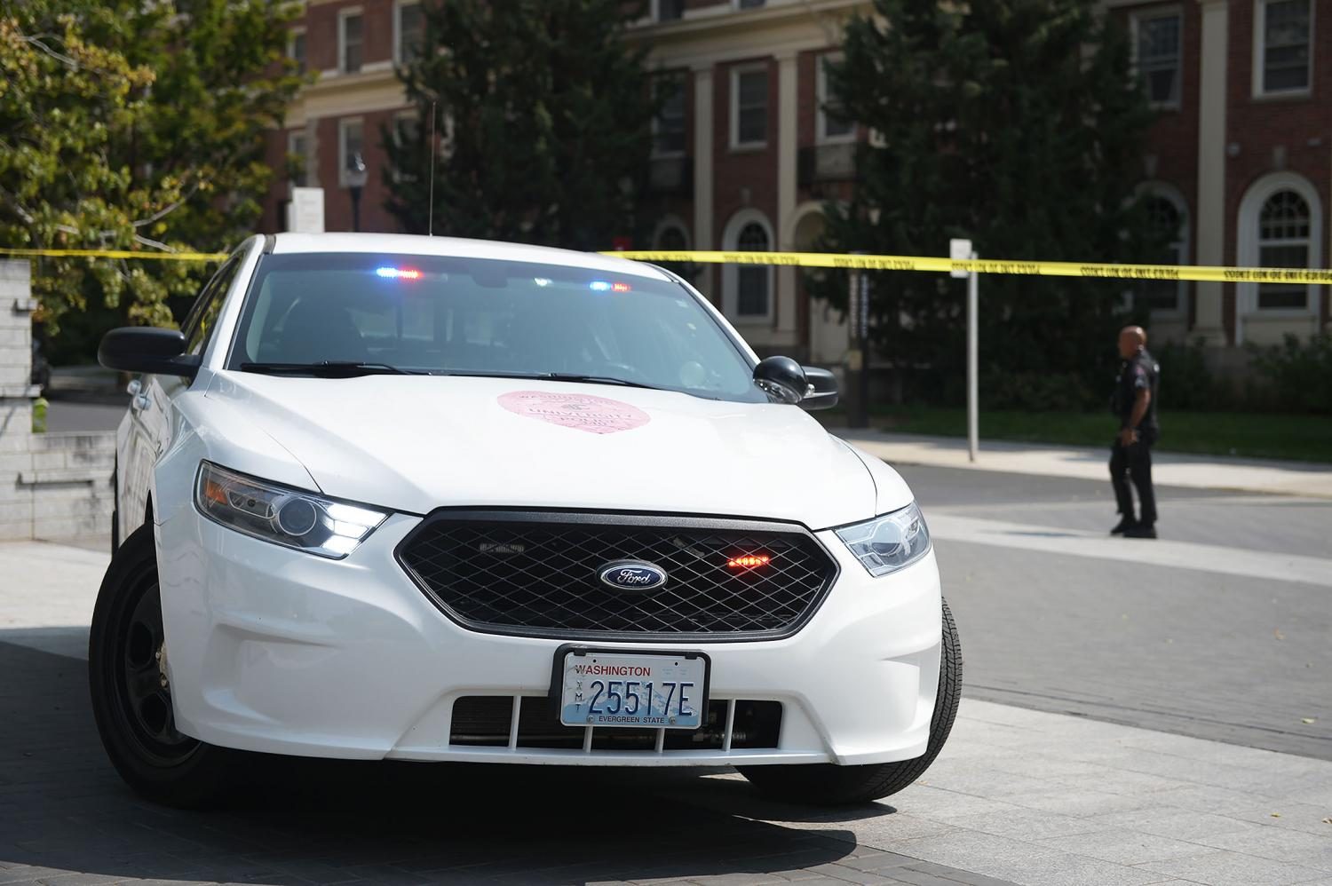 A WSU police car parked outside Stimson Hall, which was evacuated and cordoned off following the second bomb threat to the building in three days. 