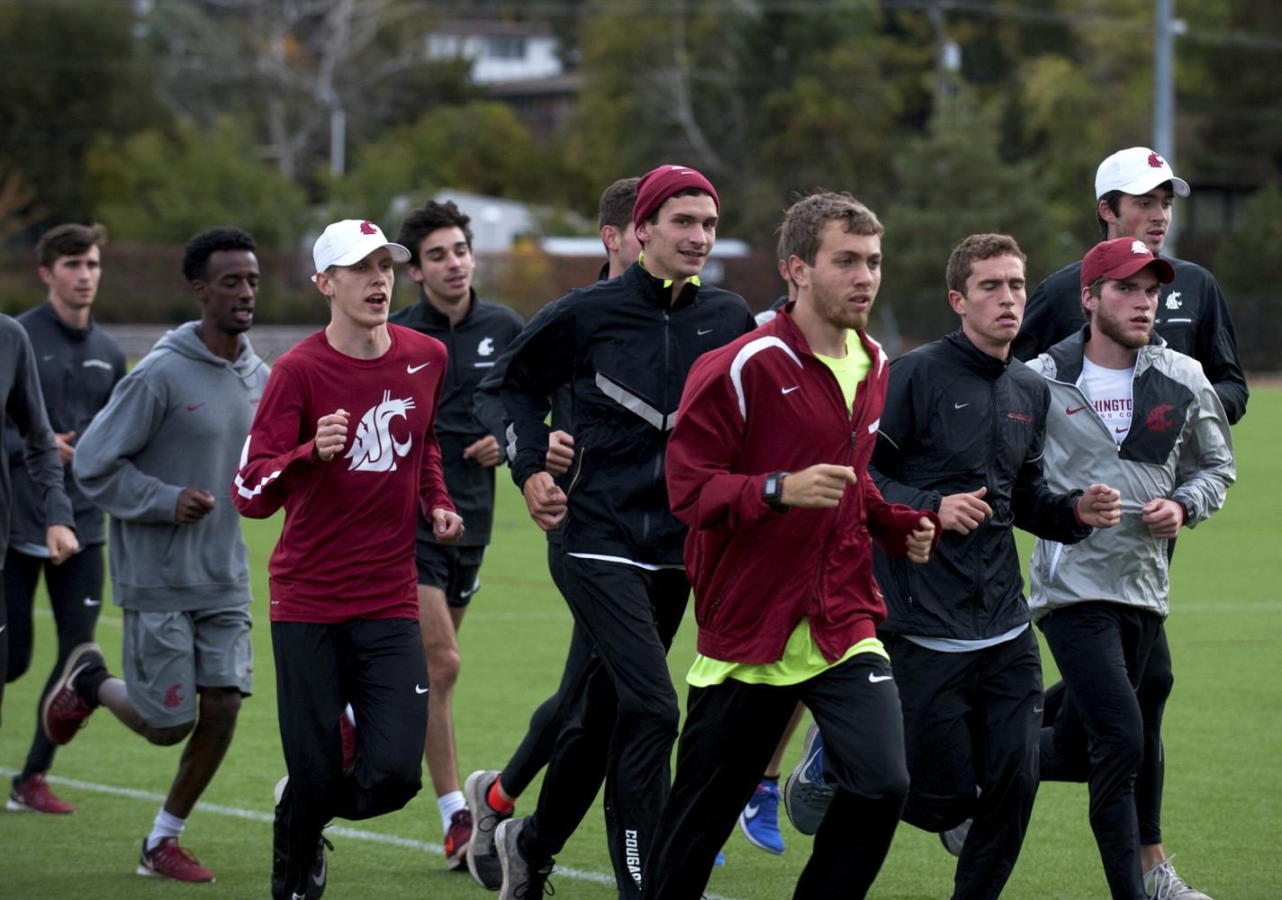 Athletes on the WSU Cross Country team warm up during a practice on October, 10 2016.
