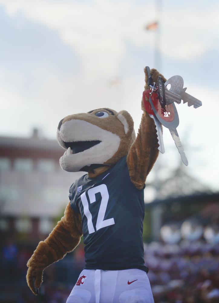 Butch T. Cougar rattles his keys in a game against Nevada on Saturday.