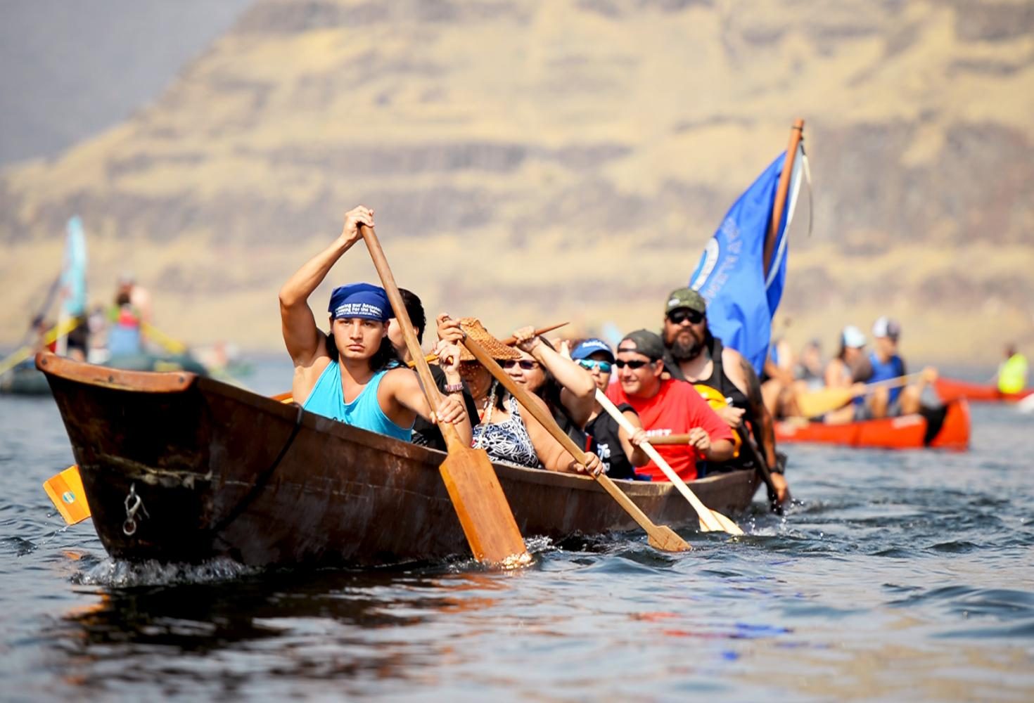 Nez+Perce+Tribal+members+paddle+down+the+river+Saturday+afternoon+at+the+Free+the+Snake+Flotilla.