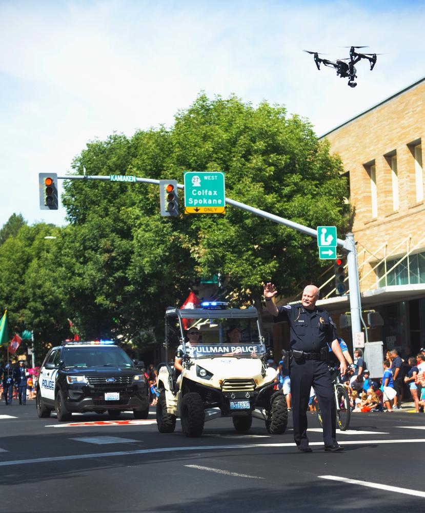 Pullman Police Chief Gary Jenkins and the department’s recently purchased drone at the Lentil Festival Parade on Aug. 18.