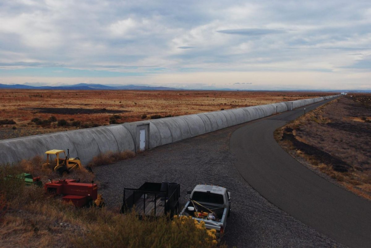 Scientists use tubes inside these concrete arms to measure fluctuations in the distance between their extremities, caused by gravitational waves.