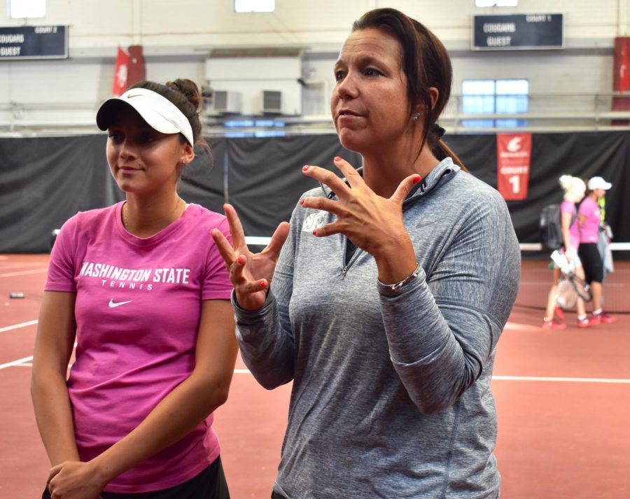 WSU+women%E2%80%99s+tennis+Head+Coach+Lisa+Hart%2C+right%2C+discusses+sophomore+player+Melisa+Ates+and+her+contributions+to+the+team.+