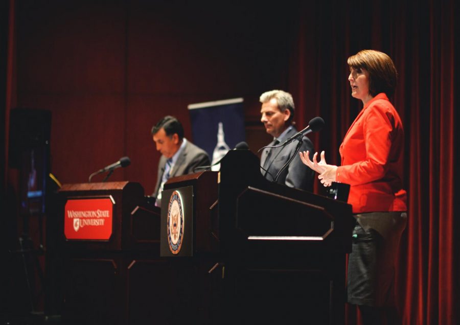 Congresswoman Cathy McMorris Rodgers, right, and Joe Pakootas, far left, at a debate hosted by the Foley Institute on Oct. 5 2016. Cornell Clayton, the director of the Foley Institute, moderates.