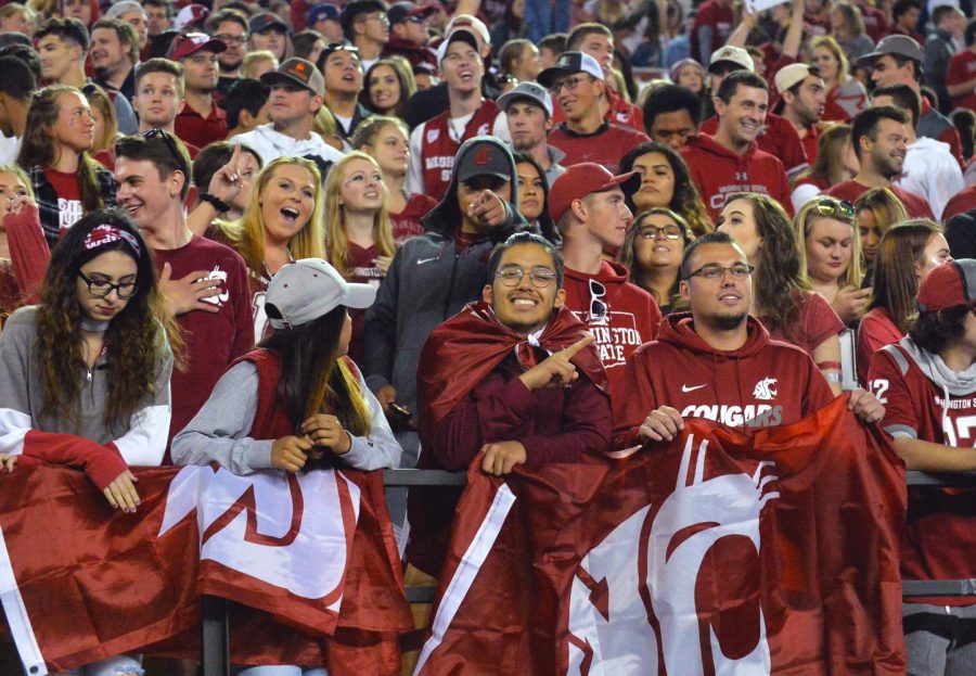 WSU fans at the football game against the University of Southern California on Sept. 29. Although athletics attracts many new students, education should be the main reason students choose WSU.