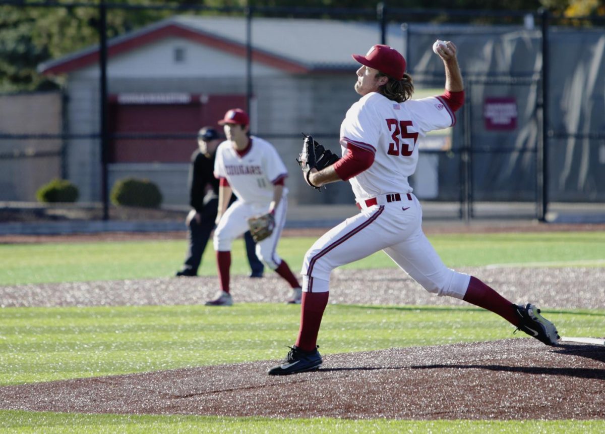 Redshirt senior right-hander Collin Maier throws a pitch during an exhibition game against 
Central Washington University on Saturday at Bailey Brayton Field.