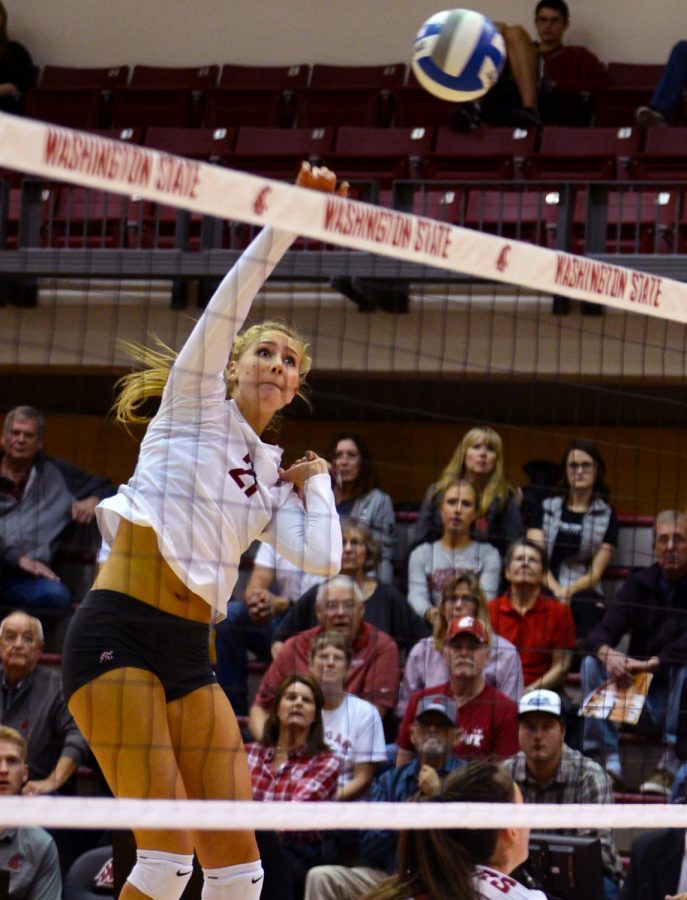 WSU senior opposite Casey Schoenlein spikes the ball in a match against University 
of Southern California on Oct. 29 in Bohler Gymnasium. WSU lost 3-0.