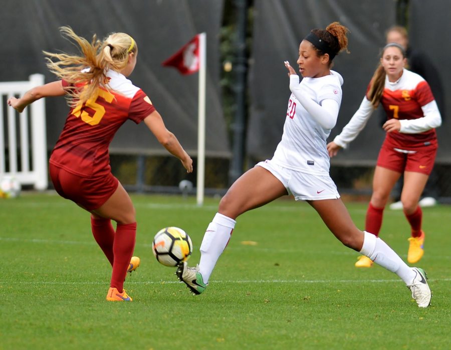 WSU+Freshman+defender+Aaqila+Mclyn+dribbles+the+ball+through+University+of+Southern+California%E2%80%99s+defense+in+a+game+Oct.+22.+