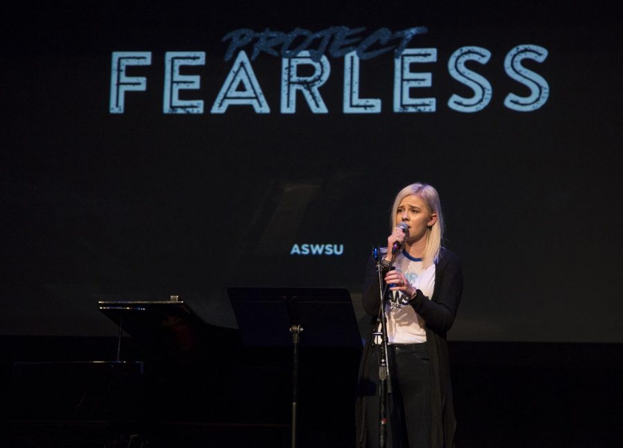 Senior crisis and risk communication major Emma Kurtenbach performs a song from the musical Dear Evan Hansen.  Kurtenbach says she performed the song with the intention of telling survivors that they are not alone.