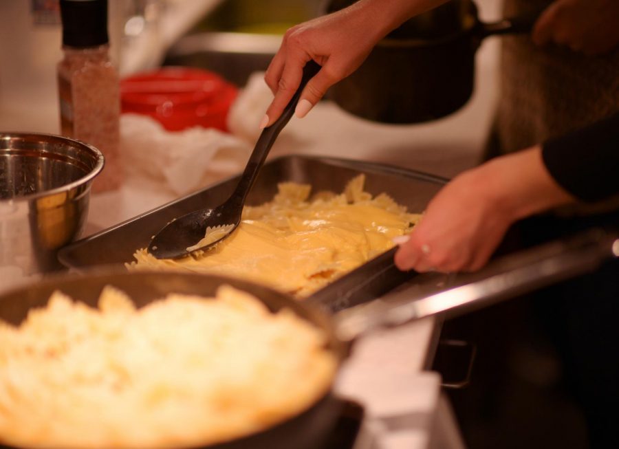 Students prepare many dishes for Thanksgiving dinner