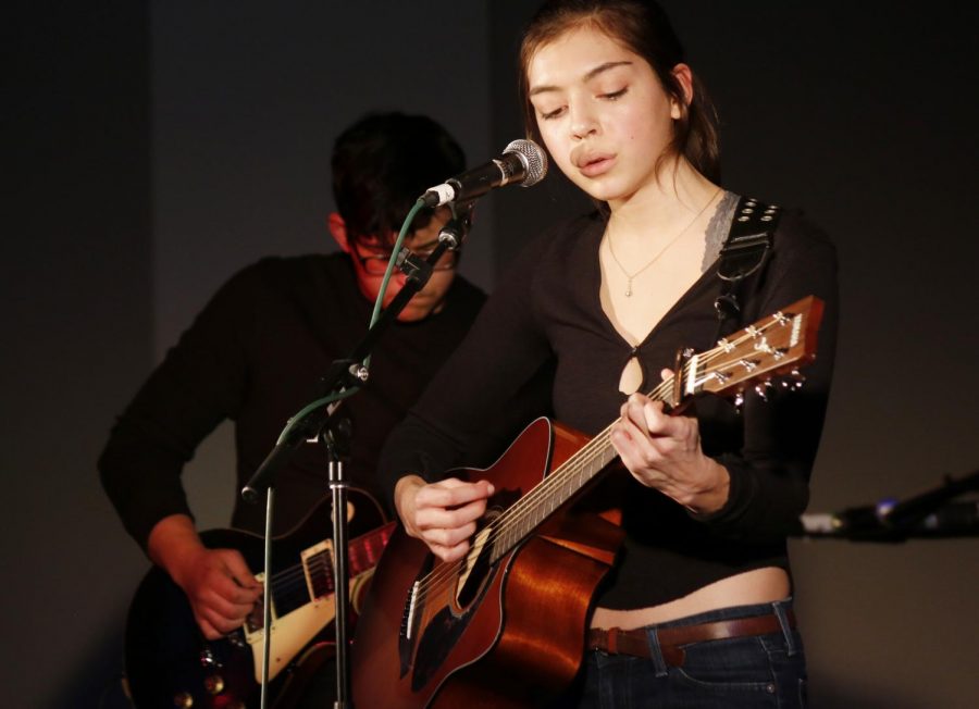 “Shyam and the Explosives” band members Claire Jacob and James Reyes play an original song in the Battle of the Bands event Tuesday night in the CUB.